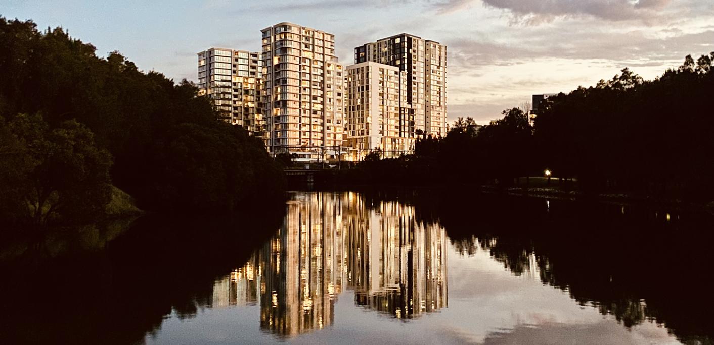 image of building at the horizon of a river