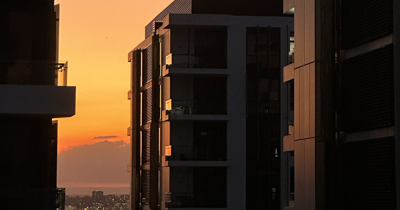 image of buildings in sunset