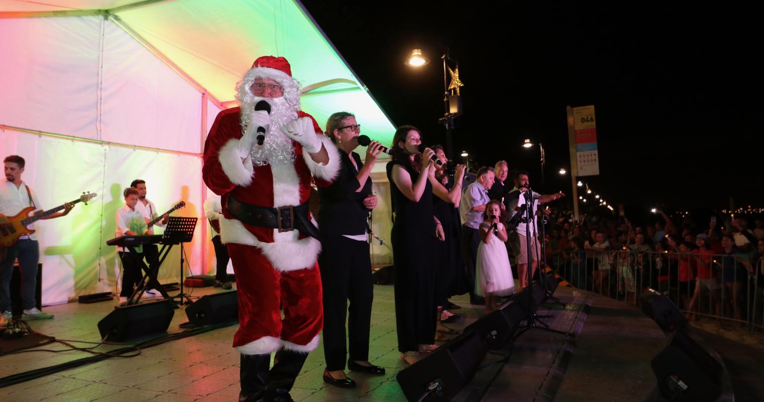 santa and performers on stage 